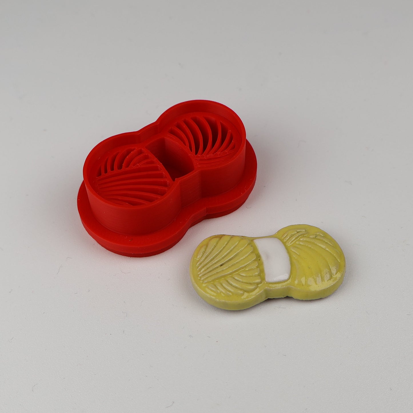 Garnnøgler udstikker med præg